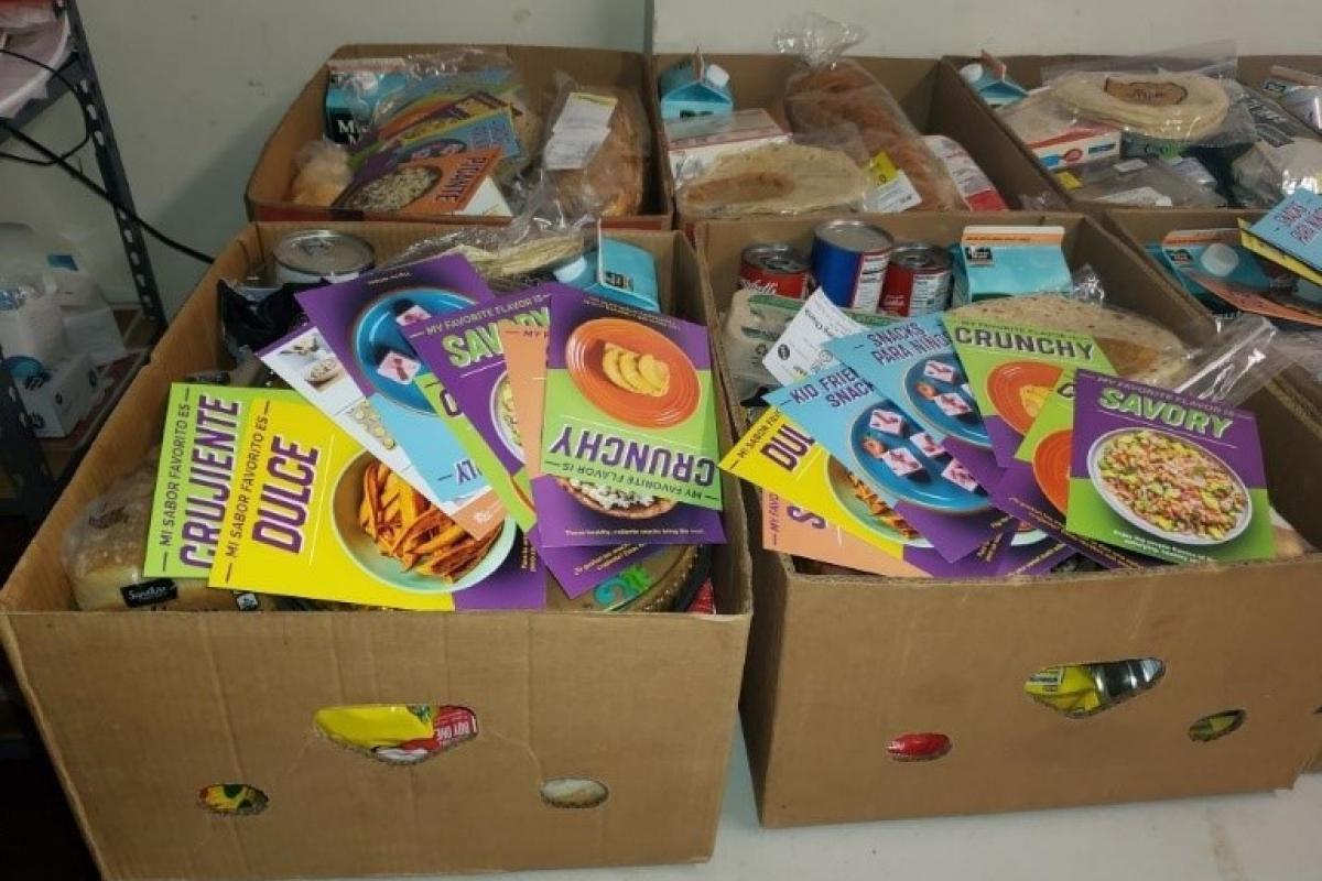 boxes of shelf stable food at a food pantry