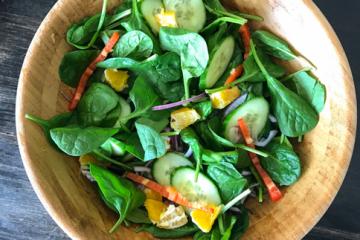 spinach and vegetables in a salad bowl