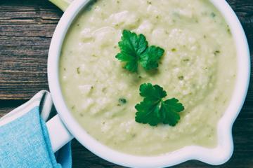 potato soup with parsley garnish
