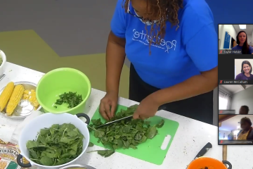 an educator chops vegetables on a zoom call while participants watch