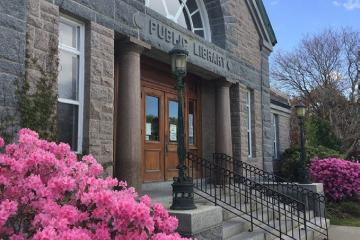 the front entrance to a public library in Maine