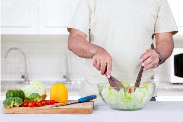 man making a salad