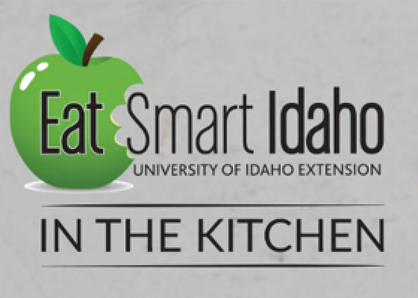 Eat Smart Idaho Univeristy of Idaho Extension In the Kitchen with a green apple with a bite taken out