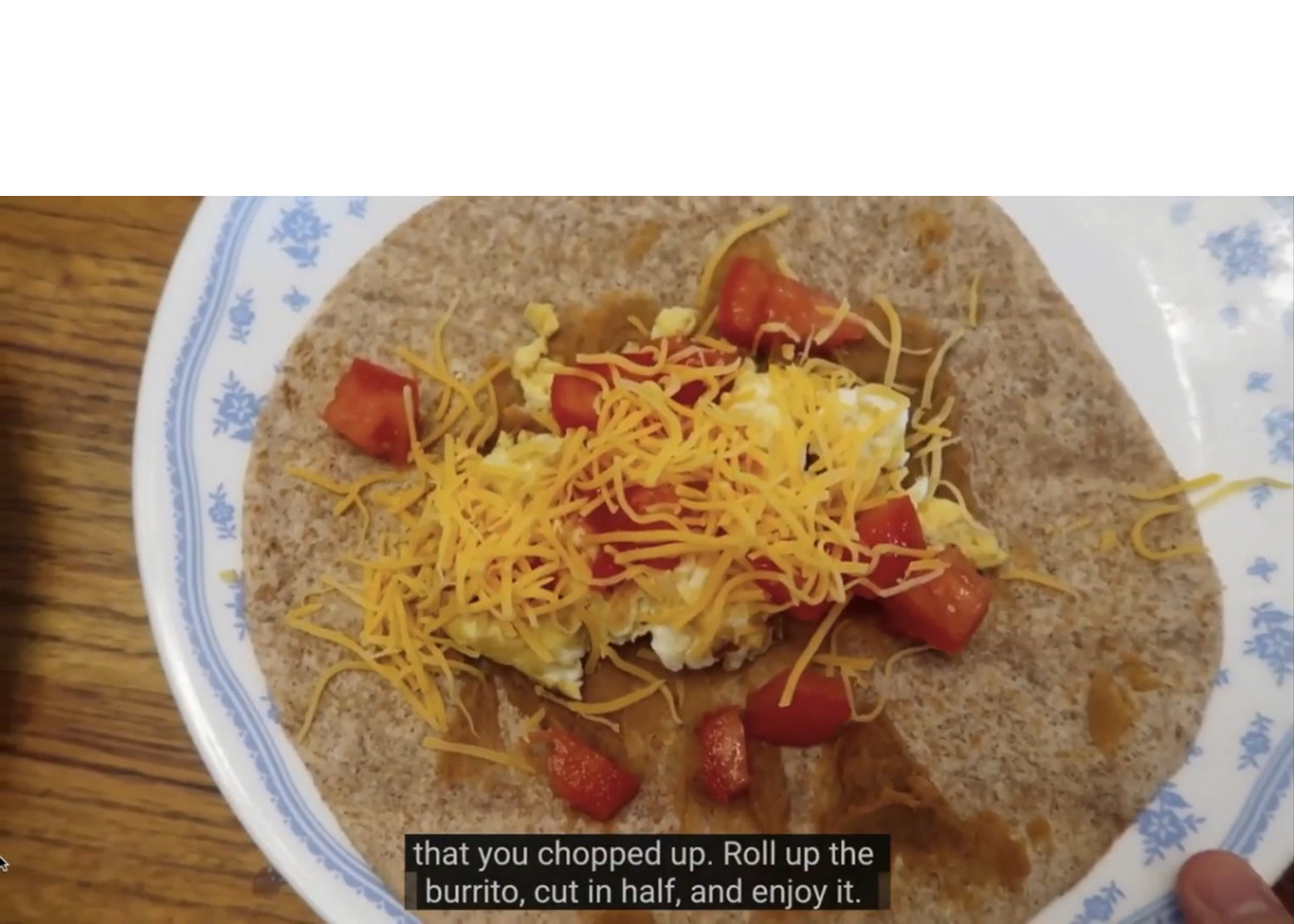 tortilla with tomatoes and cheese with instructional text