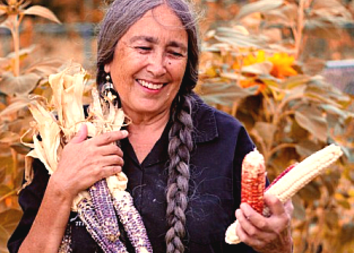 Native American woman holding corn